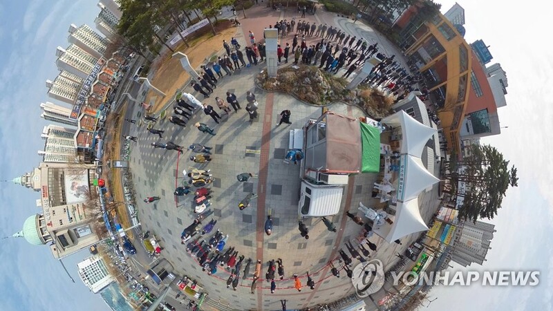 Rights watchdog urges end to 'discriminatory' coronavirus testing requirement for foreign workers