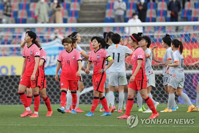 Women's football coach says Olympic dream not over yet despite loss to China