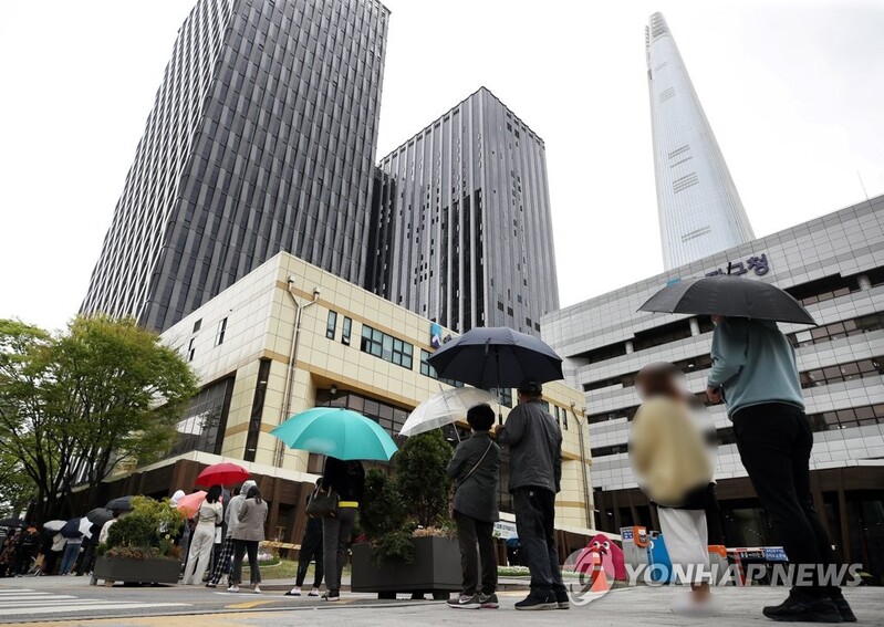 (4th LD) New virus cases back under 600 on fewer tests; curbs extended amid spring resurgence