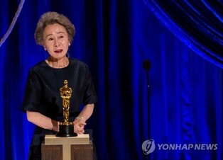 Actress Youn Yuh-jung accepts the Oscar for Best Supporting Actress with a witty speech