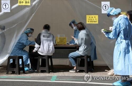 (LEAD) New virus cases in 500s for 2nd day; vaccine rollout to gather pace