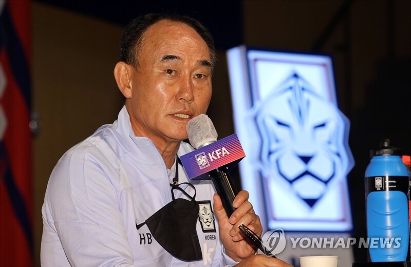 Olympic football coach urges players not to be distracted by military exemptions