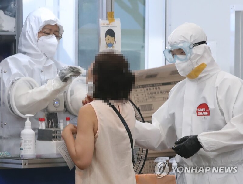 (LEAD) New daily cases set another record amid rise of delta variant