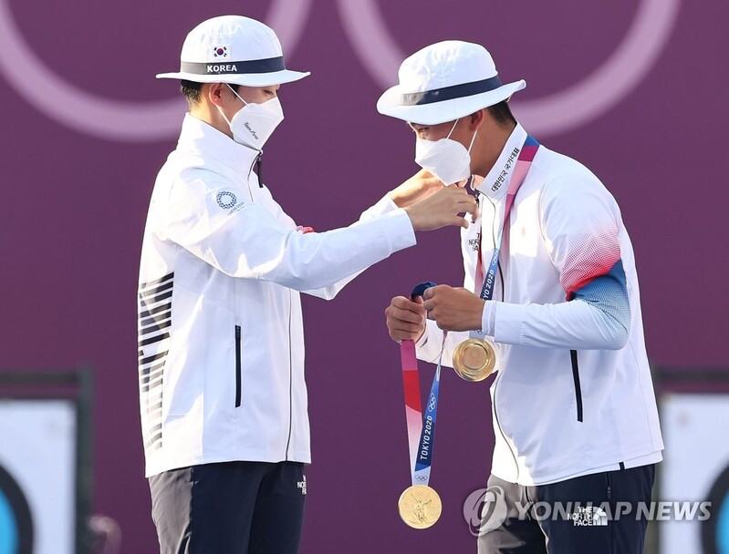 (LEAD) (Olympics) Paired with reticent teammate, brash teen archer backs up medal talk with dominant performance