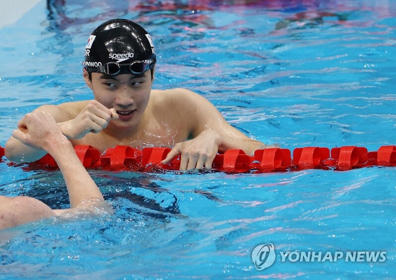 (Olympics) Teen swimmer breaks nat'l record to win 200m freestyle heats