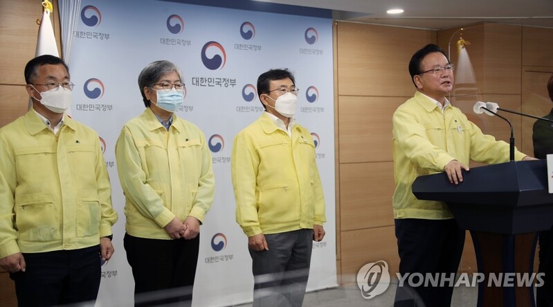 (LEAD) PM asks public to minimize travel, warns of stern measures against illegal street rallies