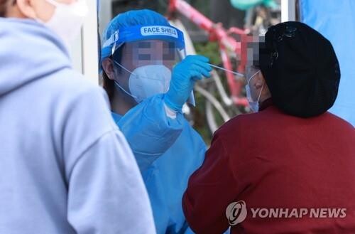 New virus cases remain in 2,000s for 4th day ahead of 'living with COVID-19' measures