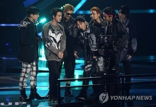 BTS becomes first Asian act to win top honor at AMAs