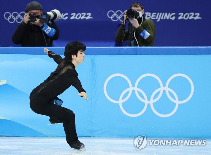 (Olympics) Figure skater poised for history; skeleton slider begins gold medal defense