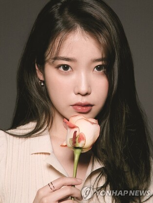 IU donates 200 million won to children and single parent families in celebration of birthday