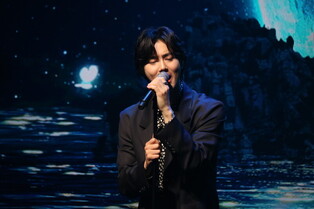 EXO Suho performing during the press conference of Songolmae