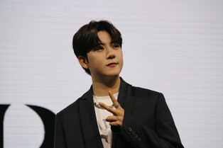 Part one of individual photo of Golden Child members during media showcase