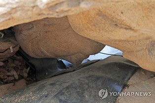Relocation of fallen 'Rock Carved Buddha in Yeoramgok Valley'