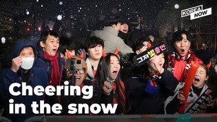 Heated cheering melts snowy winter chill away