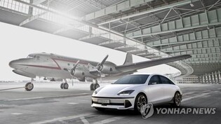 (LEAD) Auto exports hit record high in Nov. on popularity of eco-friendly cars