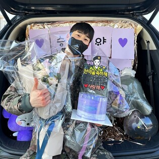 Photos of VICTON member Han Seung Woo discharged from military service