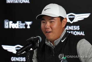 김주형 "팬으로 왔던 대회에 선수로 출전…우즈와 경기해 행복"