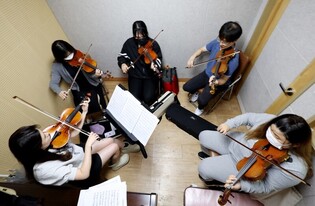 연휴 잊은 '열정'…한계 뛰어넘은 시각장애인 오케스트라