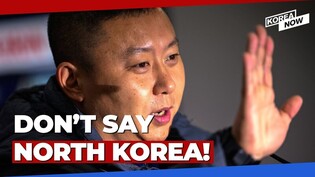 Footage of N. Korean football coach hitting back at S. Korean reporter