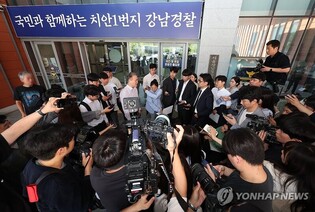 Popera singer Kim Ho-joong attends police questioning over DUI hit-and-run