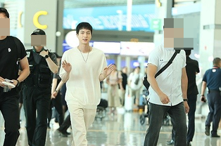 BTS Jin's Airport Fashion Grabs Attention