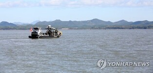 1 N. Korean defects through 'neutral waters' between 2 Koreas: military sources