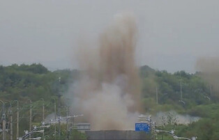 N. Korea blows up parts of inter-Korean roads