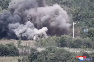 N. Korea reports its explosion of inter-Korean road, railway