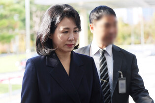 Opposition leader's wife in court