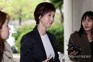 Secretary of SK chief's estranged wife given 5-yr term for fraud