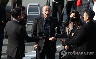 Self-proclaimed power broker appears before prosecutors