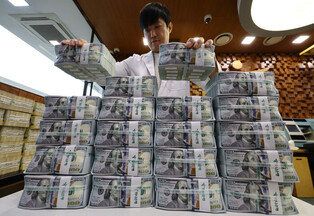 Won-dollar rate soars