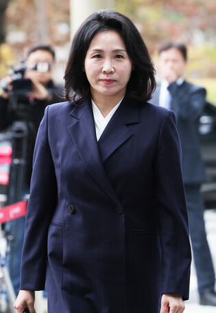 Opposition leader's wife at court