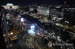(LEAD) N. Korea reports S. Korea's martial law turmoil for 1st time