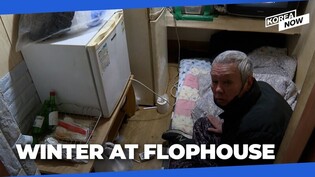 Flophouse residents survive cold with blankets