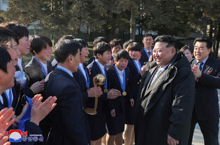 N.K. leader meets labor innovators, persons of merit