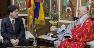 Ruling party's whip meets Buddhist sect's leader