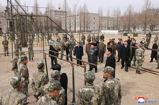 N.K. leader inspects military academy