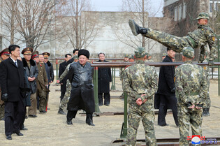 N.K. leader inspects military academy