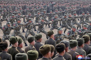 N.K. leader inspects military academy