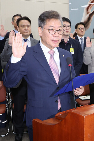 Election watchdog's official at parliamentary session