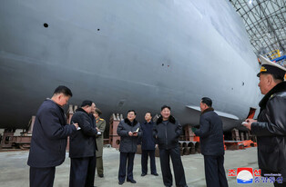 N. Korean leader inspects nuclear-powered submarine construction