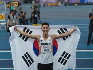 High jumper Woo wins world indoor athletics championships event