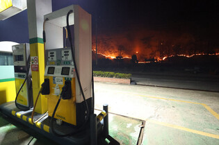 Gas station closed as wildfires spread