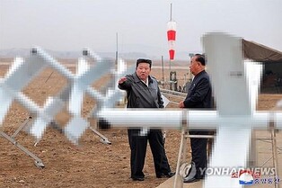 N. Korea's Kim oversees test of AI-powered 'suicide attack drones'