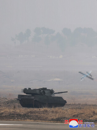 N.K. leader inspects defense science research work