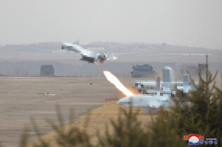 N.K. leader inspects defense science research work