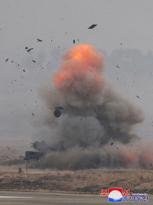 N.K. leader inspects defense science research work CR