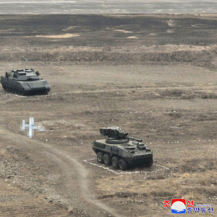 N.K. leader inspects defense science research work