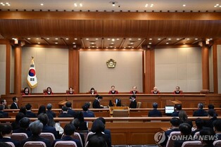 Acting president appoints 9th justice to Constitutional Court